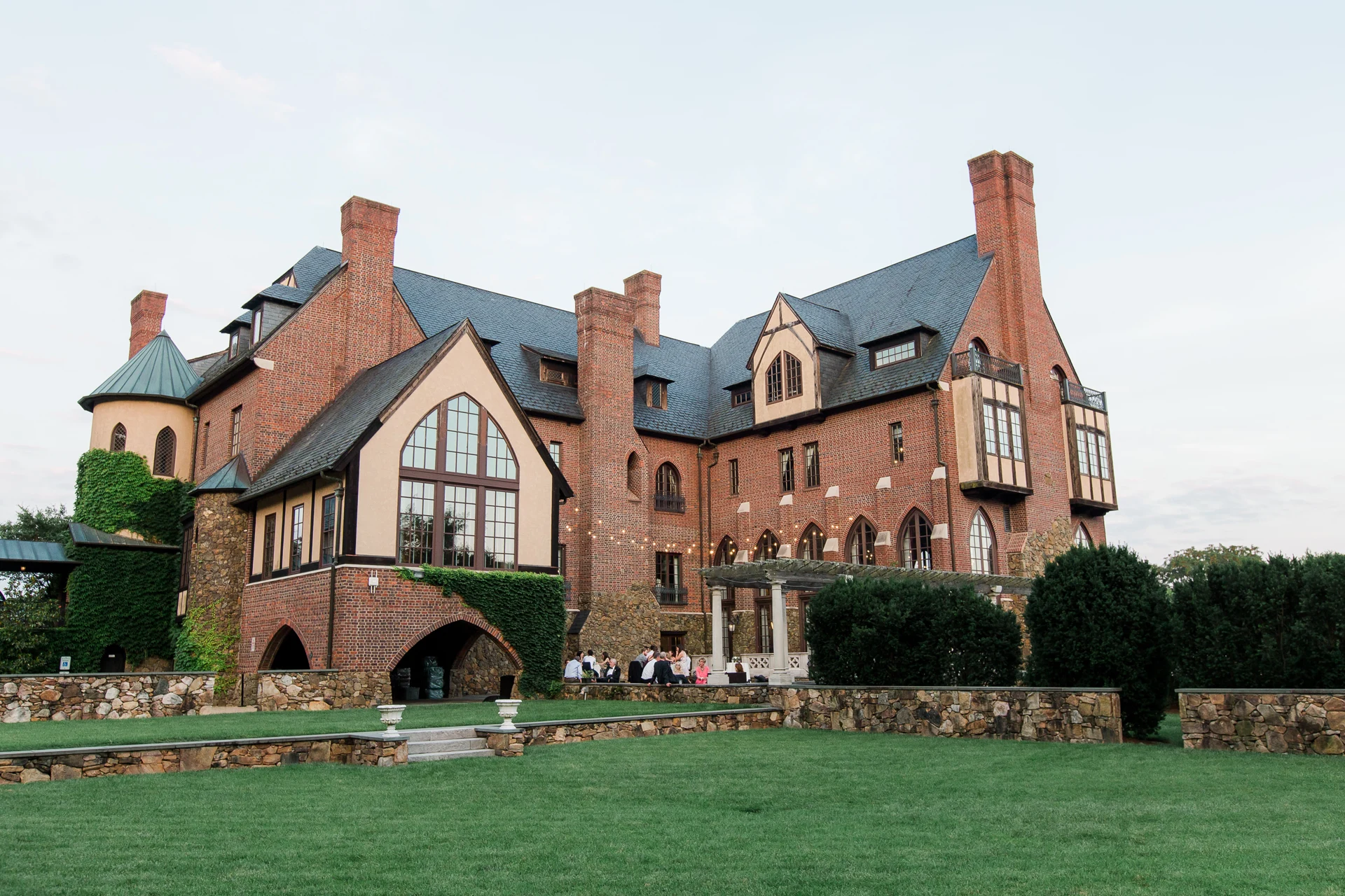 The garden-facing facade and terraces of Dover Hall